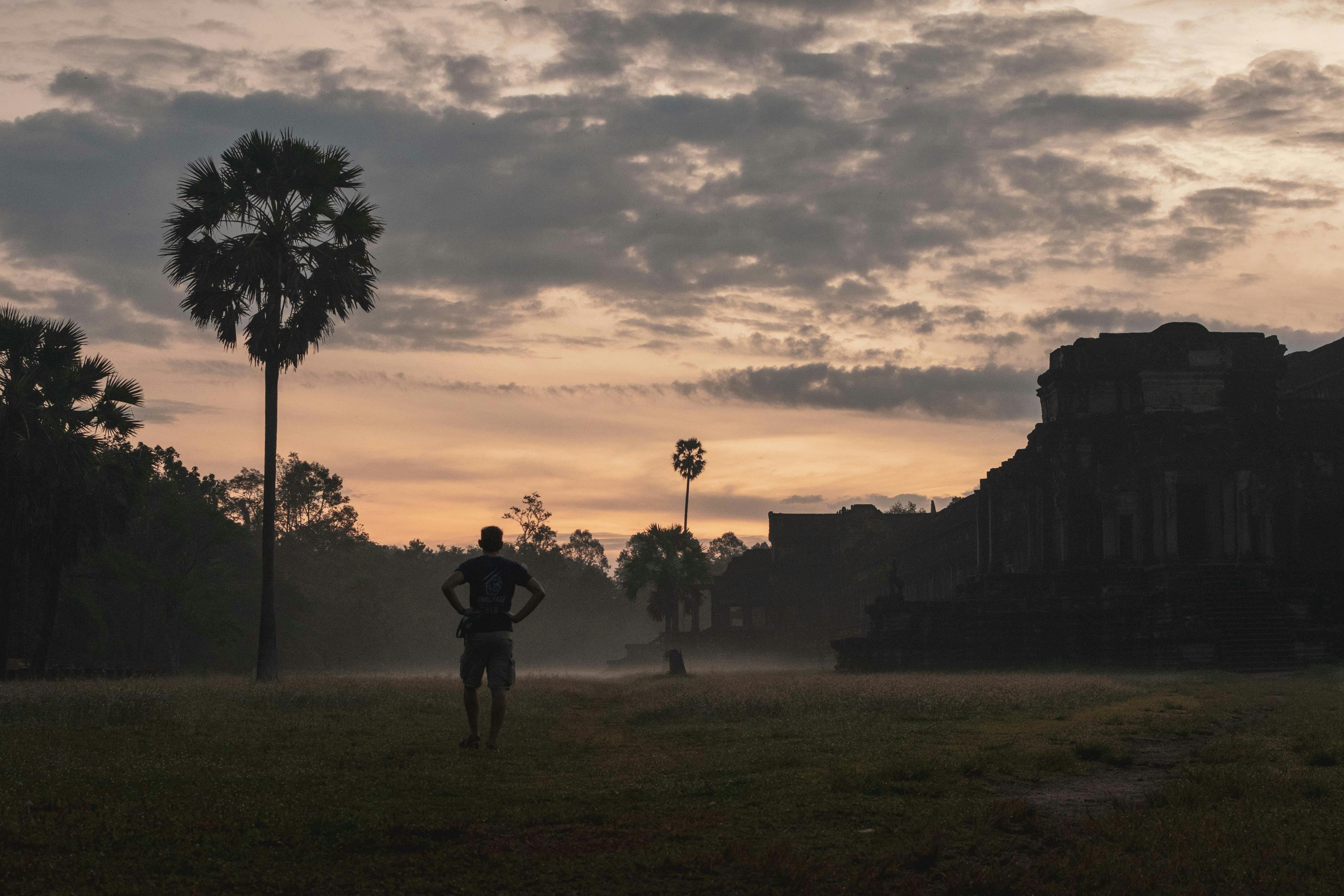 Travelers exploring Cambodia temples and landscapes